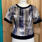 Blouse noire et impression graphique