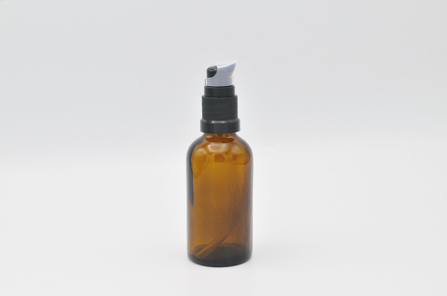 Amber glass cream pump bottle